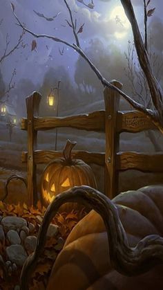 a pumpkin sitting on top of a pile of leaves in front of a fence with lights