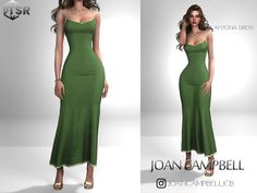 a woman in a long green dress poses for the camera and looks like she's wearing