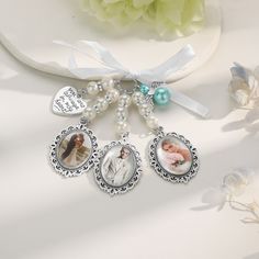 a white table topped with pictures and pearls