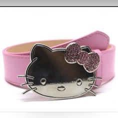 a pink hello kitty belt with glitter hearts on the front and back of it's buckle