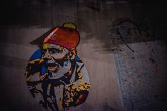 a skateboarder with a red hat on his head