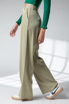 The perfect versatile slacks with pockets, high waist and wide pant legs. Pair them with your favorite sneakers for a casual look or dress them up with some heels. -High-waist -Waist pleat detailed -Woven wide pants SPEC Outseam 43 1/4 Waist 13 1/4 Leg Opening 10 1/2 100%Polyester Model's height is 5' 7" and wearing a size S Tailored High Waisted Pants, High Waisted Tailored Trousers, Pleated Pants Outfit, Green Slacks, Chinese Fancy Dress, High Waisted Pants Outfit, Trousers Women Wide Leg, Thrift Inspo, Head Shoulders