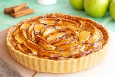 an apple tart with cinnamon swirl on top