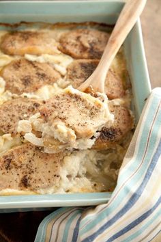 a casserole dish with chicken and potatoes