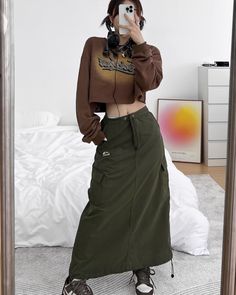 Casual Long Cargo Skirt With Pockets, Casual Long Cargo Skirt, Green Utility Mini Skirt, Khaki Cotton Cargo Skirt For Fall, Khaki Cotton Cargo Skirt, Fall Khaki Cotton Cargo Skirt, Y2k Cotton Cargo Skirt For Streetwear, Casual Khaki Skirt With Cargo Pockets, Casual Drawstring Skirt For Fall