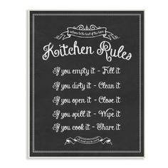 a framed chalkboard with the words kitchen rules written in white lettering on black paper