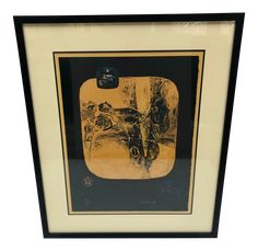 an image of a man on a motorcycle in black and gold framed art print by unknown artist