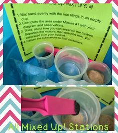 some cups and spoons sitting on top of a blue tray with pink handles in them