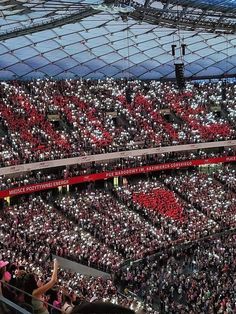 a large stadium filled with lots of people