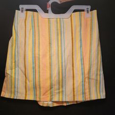 Variety Of Different Colors On The Skirt. Does Go Above The Knees. Summer Striped Lined Skort, Striped Lined Skort For Summer, Short Striped Skirt For Spring, Retro Striped Summer Skirt, Summer Retro Striped Skirt, Retro Striped Skirt For Summer, Spring Striped Skort With Lined Skirt, Spring Striped Lined Skort, Striped Summer Skirt