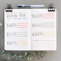 a planner with the words future log written on it next to some flowers and leaves