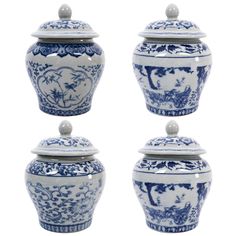 four blue and white vases with lids on each one, all decorated in different designs