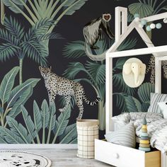 a leopard and giraffe wallpaper in a child's room with a bed