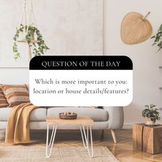 a living room filled with furniture and plants on top of the floor next to a white wall