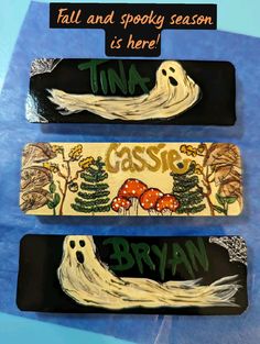 three skateboards with different designs on them