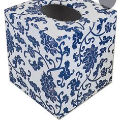 a tissue box with a blue and white pattern on it