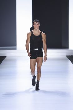 Noah models a ribbed knit tank top, high-waisted underwear with #DGReEdition label, and high-top running shoes. Ribbed Knit Tank Top, Knit Tank Top, Knit Tank, Knitted Tank Top