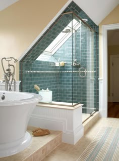 a bathroom with a skylight above it and a bathtub in the middle of the room