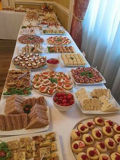 a long table filled with lots of food