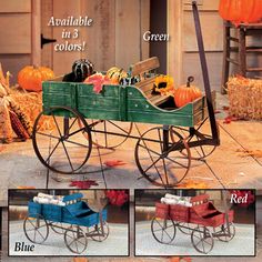 a green wagon filled with flowers and pumpkins