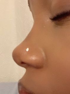 a woman's nose is shown with the tip of her nose visible