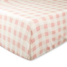 a pink and white checkered bed sheet