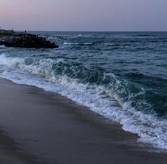 the waves are coming in to the shore