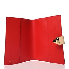 This is an authentic LOUIS VUITTON Monogram Paul Notebook Cover MM. This stylish notebook is crafted of Louis Vuitton monogram toile coated canvas. The agenda opens with a polished brass press lock to a red crossgrain leather interior with patch pockets. Notebook Cover, Leather Interior, Polished Brass, Authentic Louis Vuitton, Louis Vuitton Monogram, Patch Pocket, Dust Bag, Notebook, Monogram