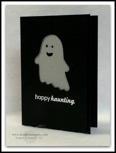 a black and white halloween card with a ghost on it's front, says happy hanning