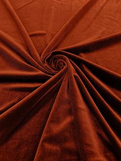 a close up view of an orange fabric