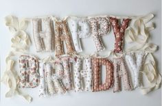 the words happy birthday are made out of fabric