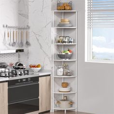 a kitchen with white marble walls and shelves filled with dishes, utensils and pans