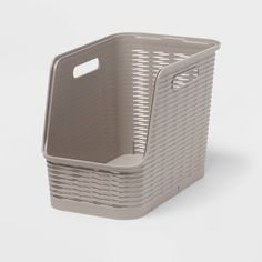 a gray basket with handles on a white background