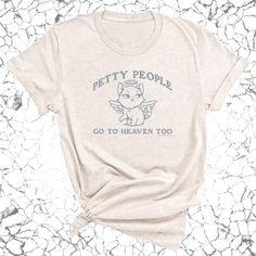 Elevate your style and spirit with our 'People Go to Heaven Too' graphic tee. Crafted with comfort in mind and adorned with a celestial design, this unisex shirt is a reminder of the journey toward eternal bliss. Let your wardrobe reflect your faith with this heavenly addition. Unisex sizing Runs true to size 100% combed ring-spun cotton 4.3-ounce jersey knit fabric Side-seamed NEXT LEVEL APPAREL COTTON CREW - 3600 We print each item on demand. Please review the FAQs for our current production t Petty People, Celestial Design, To Heaven, Jersey Knit Fabric, Unisex Shirt, The Journey, Black Tee, Graphic Tee, Knit Fabric