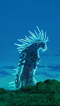 a blue and white creature standing on top of a rocky hill under a blue sky