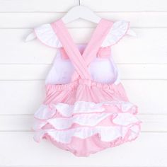 Adorable light pink gingham ruffle bubble! Features birthday girl smock plate and ric rac trim. Perfect for a birthday! Cute Ruffled Sets For Playtime, Cute Ruffled Sets For Playwear, Cute Ruffled Playwear Sets, Playful Pink Bloomers For Spring, Cute Ruffled Bloomers For Spring, Cute Spring Bloomers With Ruffles, Cute Pink Bubble Romper With Smocked Back, Pink Ruffled Bloomers For Summer, Summer Playtime Ruffle Bloomers