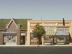 an artist's rendering of a storefront with children's shoes on the front