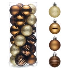 christmas ornaments are in a clear container with gold and silver baubles next to each other