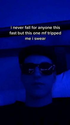 a man wearing sunglasses is looking at the camera with a blue light behind him that says i never fall for anyone this fast but this one mf tripped me i swear