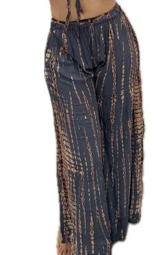 Introducing our tie dye Wide-leg Pants This wide-leg pants is designed for those who appreciate a perfect blend of  sophistication style   wide leg making it standout choice for any formal event and informal The essential wide-leg you'll wear over and over, to the music festival, your dinner date, and everywhere in between. With pull-on styling, these wide-leg wonders are super soft to give you ultimate comfort. Pair this with any of our best selling tops     (Pattern and colors may vary slightly) One size - Fits sizes 2 -18 Wide leg style Rayon Machine washable Made in Thailand RAYON - Luxuriously soft  our exclusive blend drapes like a dream and moves with your body. The durable, medium-weight fabric is flattering and elegant, wrinkle-free, and keeps its shape, wash after wash. HAND PAIN Boho Chic Pants, Dye Pants, Bohemian Pants, Pants Boho, Tie Dye Hippie, Tie Dye Pants, Boheme Chic, Festival Pants, Hippie Pants