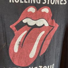 Band:rolling stone    Size:  18" pit to pit  &      20" collar to bottom  Colors: black  Condition: excellent  Date :8/8/24 **all of our shirts are PRE-OWNED and may contain normal wear, fading, stains or imperfections, holes, tears, loose or missing threads. We will do our best to point out significant issues. Thank you for looking!! #tshirt #fashion #clothing #streetwear #shirt Rolling Stones Shirts, Tee Shirt Rolling Stones, Black Rock T-shirt With Screen Print, Rolling Stones Tshirt, The Rolling Stones Shirt, Tshirt Fashion, Clothing Streetwear, Streetwear Tshirt, Rolling Stone