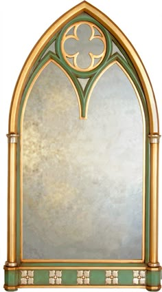 an arched window with green trim on the side and gold frame, in front of a white background