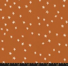 an orange background with white stars on it