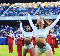 the cheerleaders are performing on the field