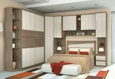 a bedroom with white and brown furniture in it