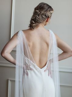 Beautiful and soft bridal cape with cascading pearls. Made of luxurious english net fabric to create an effortless drape. Faux pearls embellish this cape starting dense at the top and trickling down as they get further down the back. Cape attaches at the shoulders with either small white ribbons (for dresses with spaghetti straps) or small 1 inch clasps (for dresses with thicker straps). Attaches at the shoulders and drapes into a "V" shape. Lengths:-Floor (65 inches)-Chapel (80 inches)-Cathedra Tulle Wedding Veil, Veil Accessories, Wedding Cape, Tulle Bows, Bridal Gloves, Bridal Cape, Bow Hair Accessories, Pearl Bridal, Long Gloves