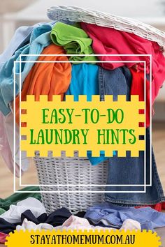 a laundry basket full of clothes with the words easy to do laundry hints