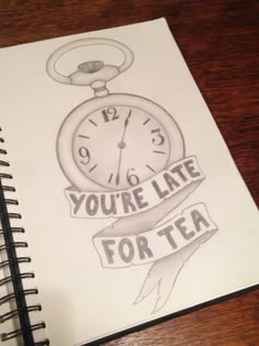 a notepad with a drawing of an alarm clock and the words you're late for tea on it