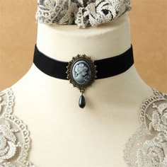 Our Victorian Choker : Timeless Elegance Have you ever dreamed of wearing a jewelry piece that celebrates your femininity while staying true to a timeless style? The Victorian Choker necklace is the answer to your dreams. Don't wait any longer to add this steampunk choker necklace to your jewelry collection. Order today and enjoy fast and free shipping as well as a 100% satisfaction guarantee! More about the choker: Total length 14 inches |36 cm Style: Neo-Gothic Material: velvet, zinc alloy Loo Victorian Choker Necklace, Cameo Choker, Steampunk Choker, Victorian Style Jewelry, Black Cameo, Victorian Accessories, Vintage Choker Necklace, Velvet Choker Necklaces, Gothic Chokers