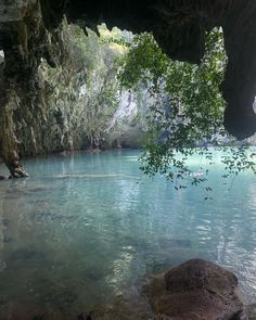 the water is clear and blue in this cave